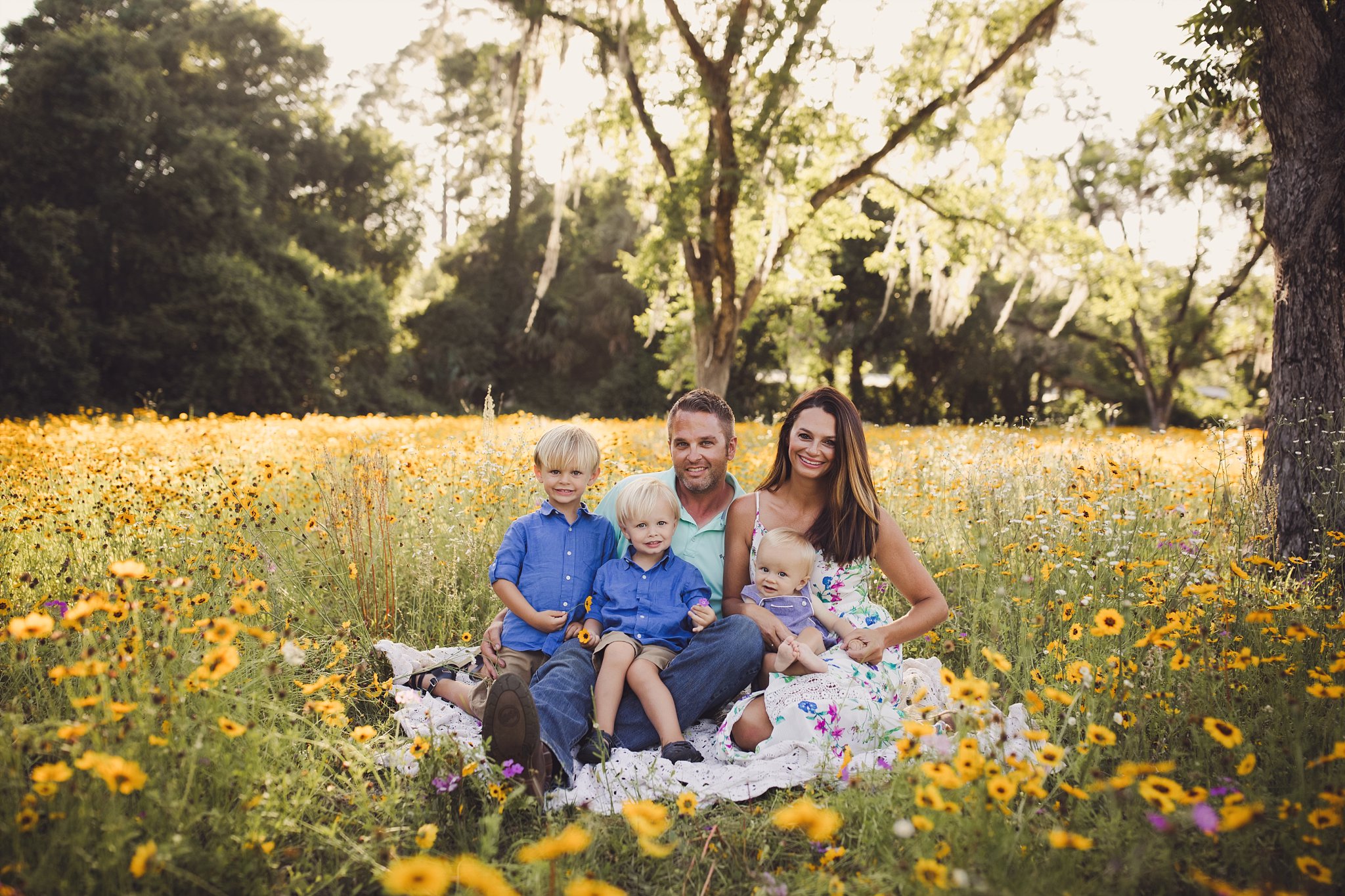 NE FL Family Photography famiy of 5 3 little boys in flower field