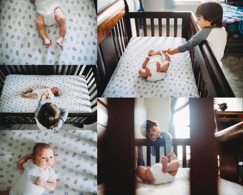 lifestyle baby photography photos of baby boy in crib with older brother looking at him