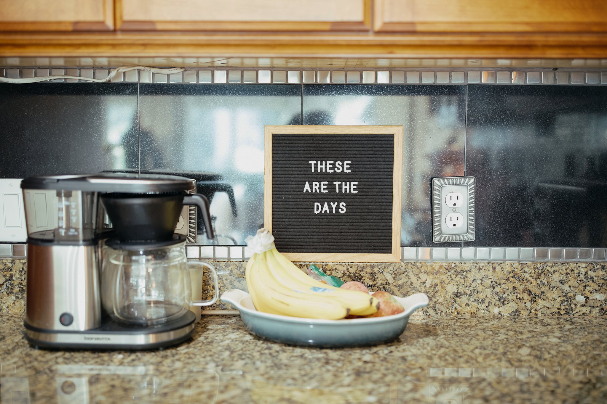 These are the days sign in kitchen