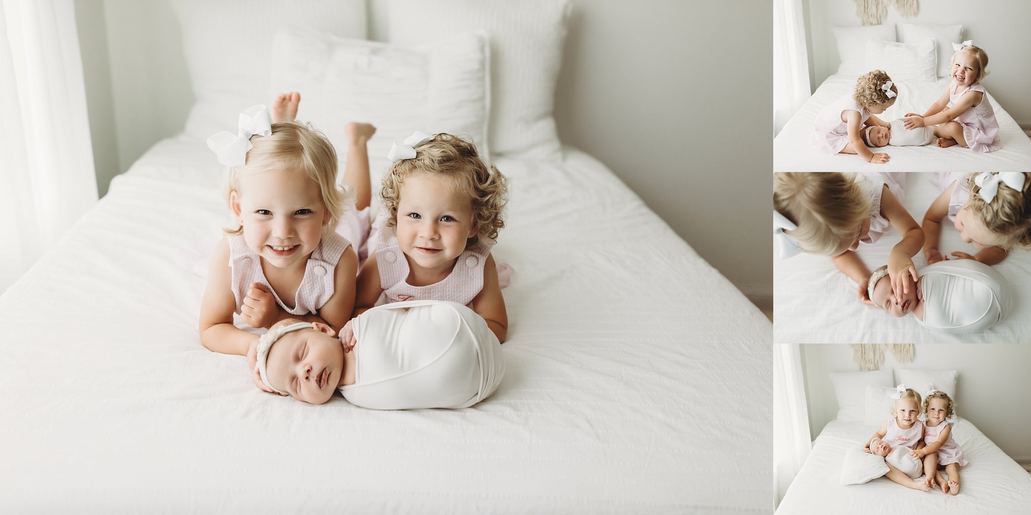 baby girl swaddled in white on white bed with big sisters