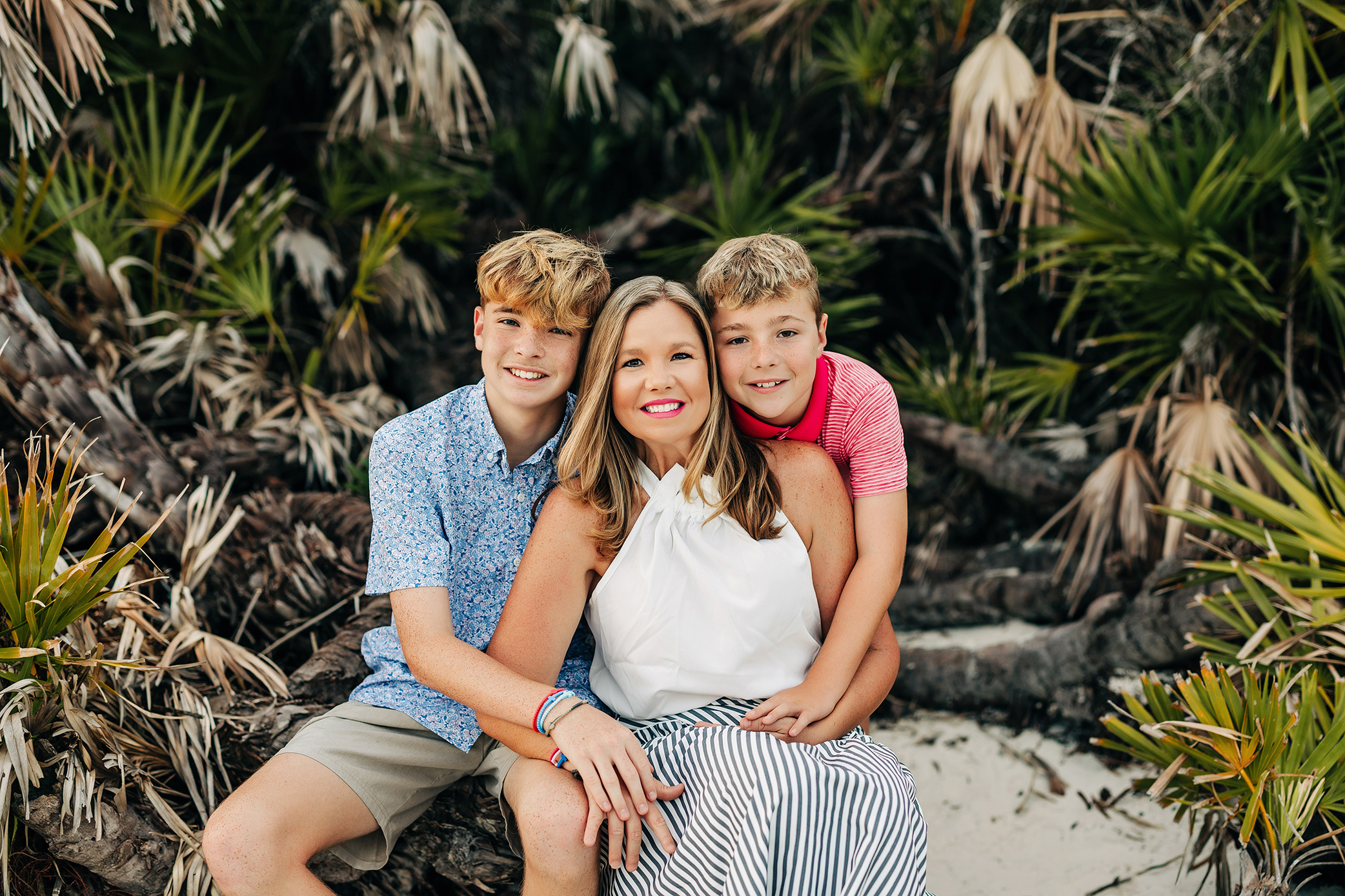 Mother with her two sons during a family photography session in St. Augustine Beach, Florida